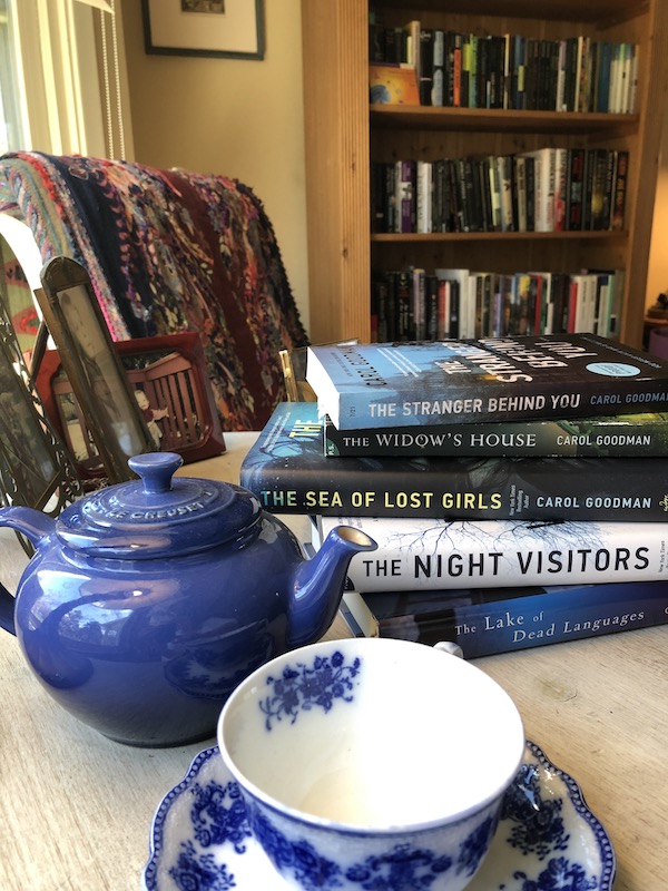 Carol-Goodman-book-club-stack-of-books-blue-teapot-teacup
